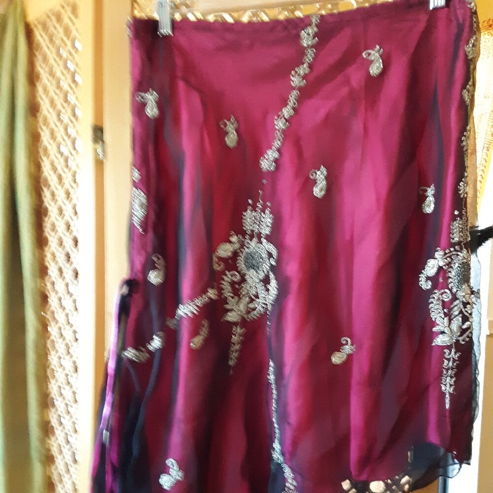 Red Asymmetrical skirt made from antique Indian Sari fabric.